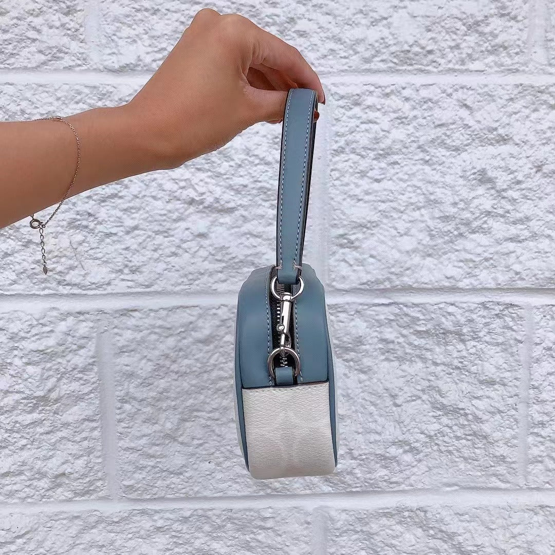 Coach CB851 Jamie Wristlet In Signature Canvas With Varsity Motif In SV/Chalk/Indigo Coach CB851 Jamie Wristlet In Signature Canvas With Varsity Motif In SV/Chalk/Indigo